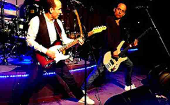 Tributo a Status Quo con guitarras eléctricas y mucha energía sobre el escenario.
