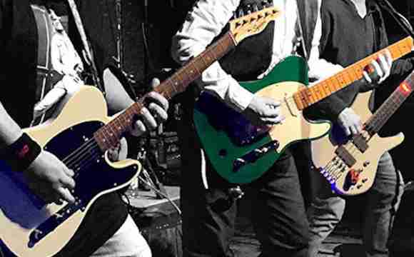Banda de versiones de Status Quo tocando en eventos y festivales en España
