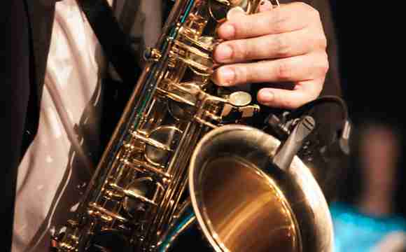 live saxofonist boeken