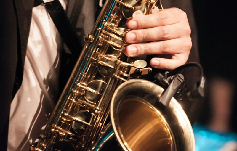 live saxofonist boeken