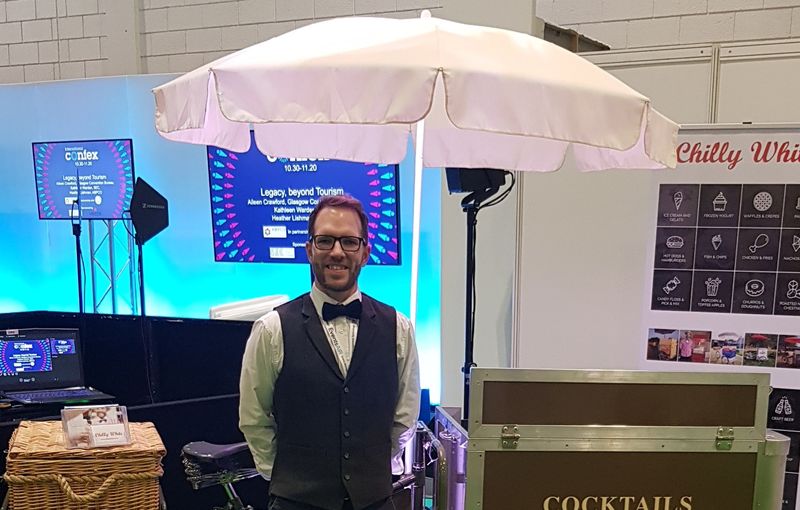 Cocktail tricycle with uniformed server